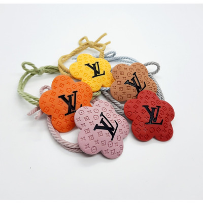 Резинка для волосся під Louis Vuitton Зображення